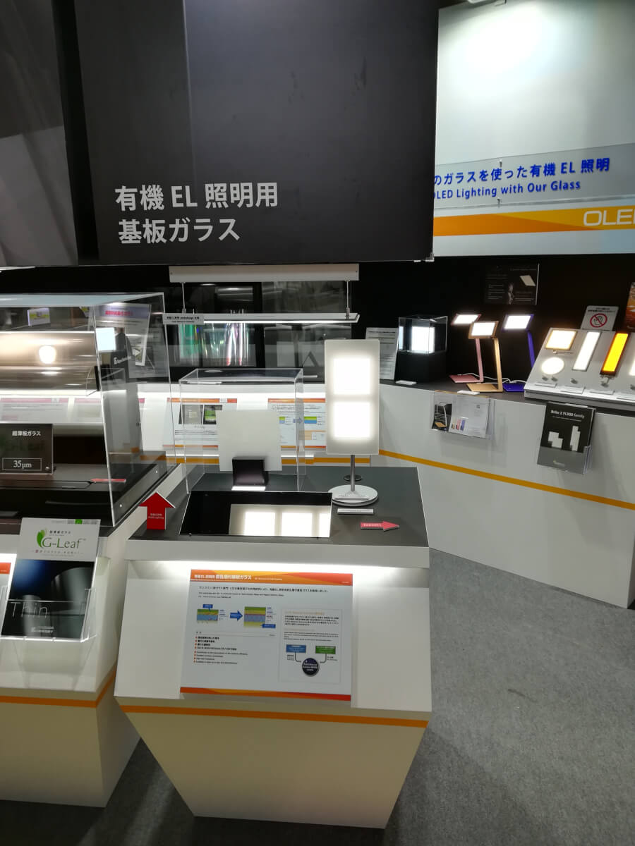 Nippon Electric Glass booth showing OLEDWorks OLED lighting panels at LED NEXT STAGE