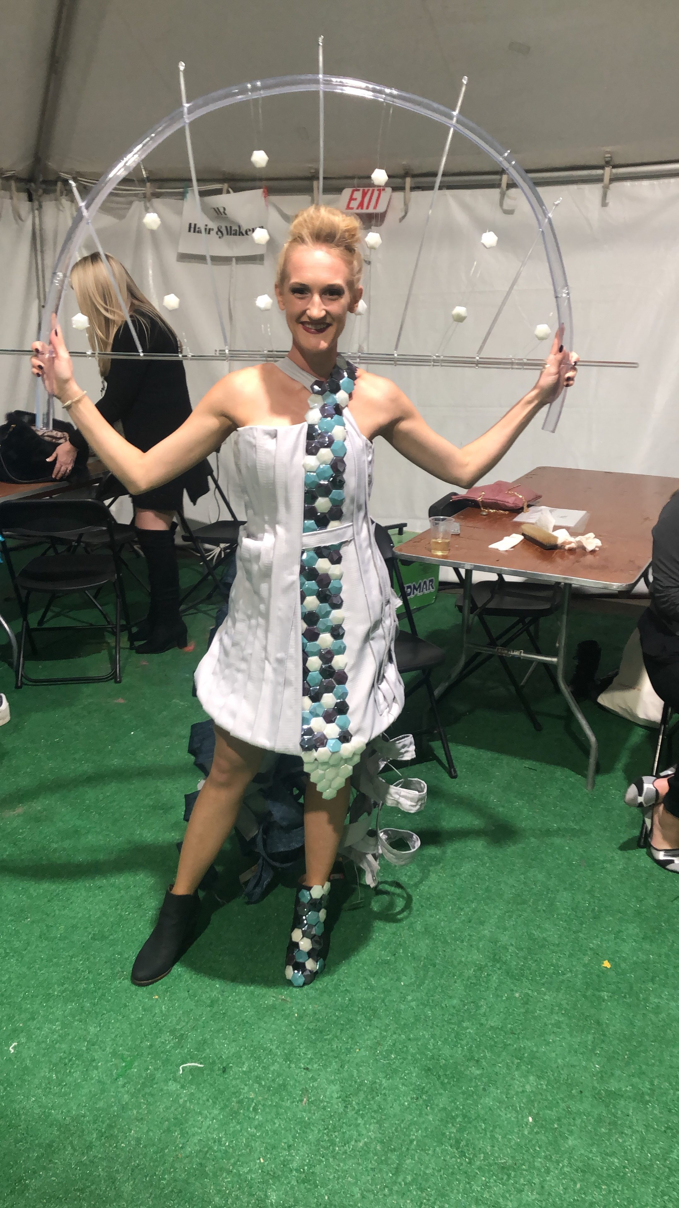 Model wearing Hunt dress with OLEDWorks panels at Runway to Rochester, 2019 | OLEDWorks