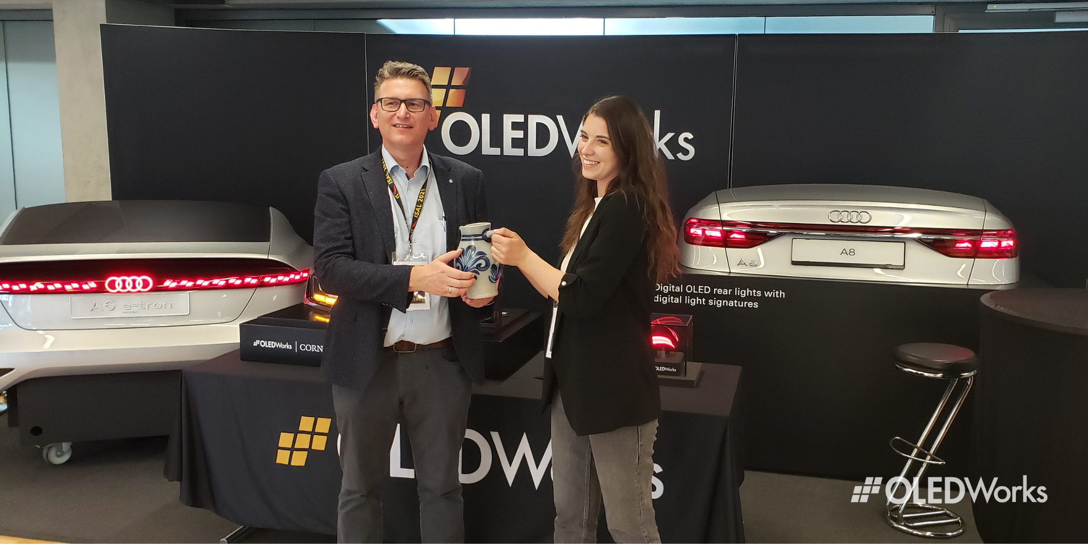 OLEDWorks accepting ISAL social media award