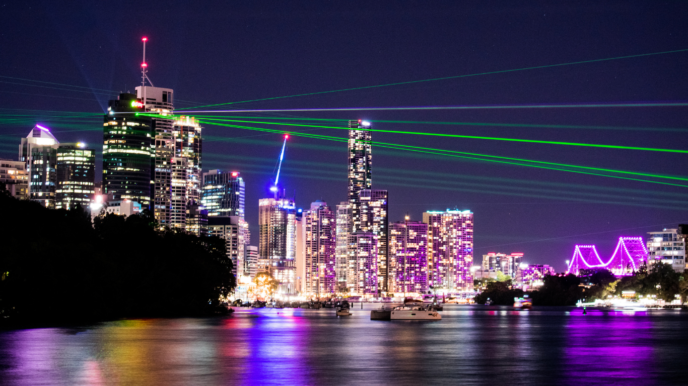 Laser lights and Brisbane City skyline.